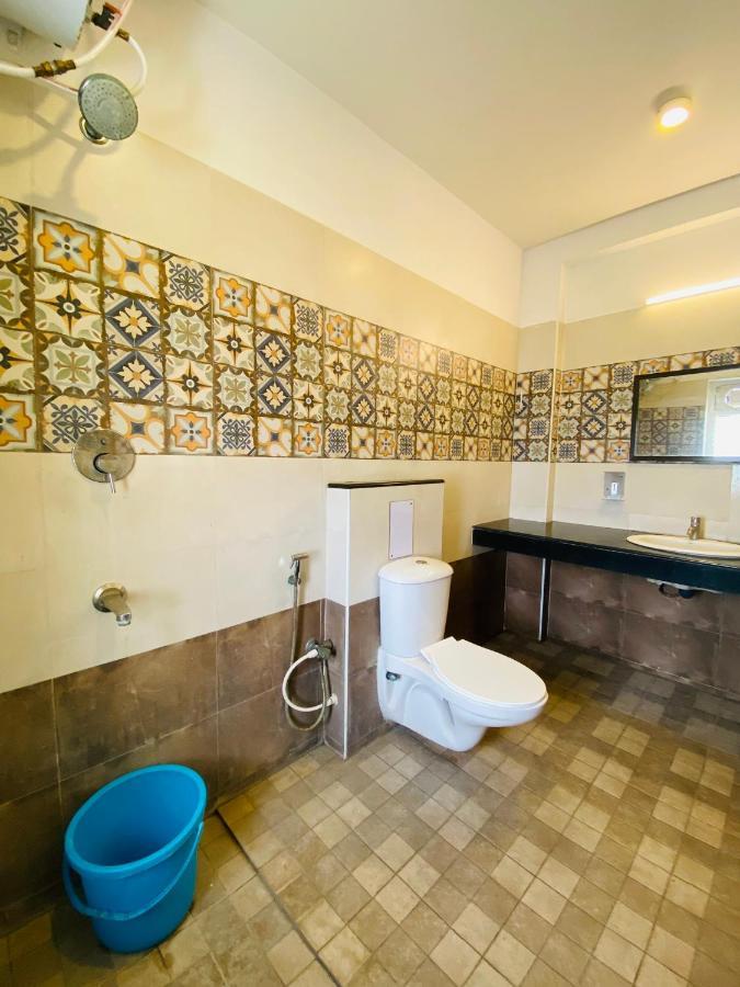 Tulips Residency - Airport Hotel Pilamedu Bagian luar foto